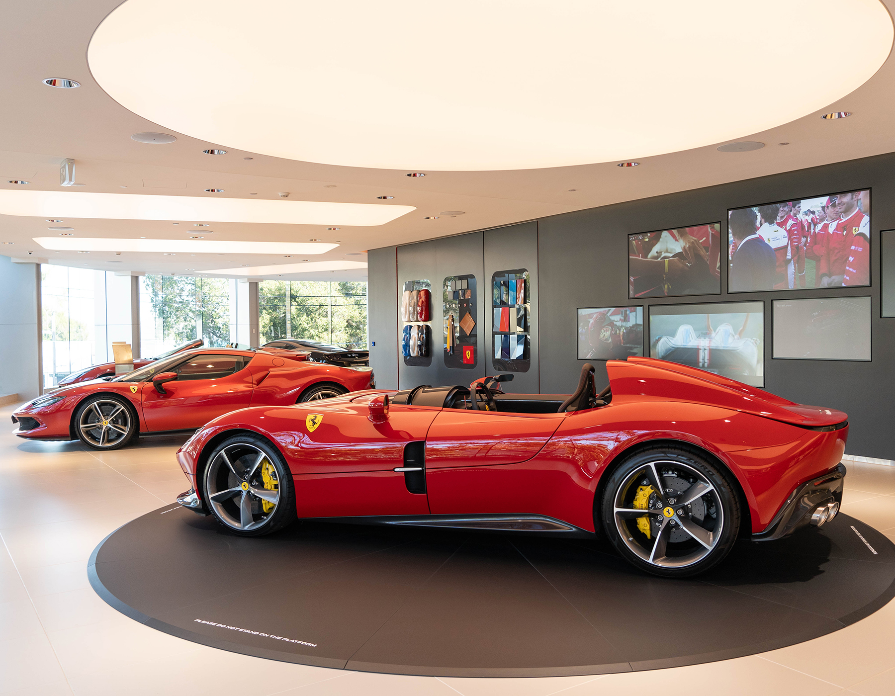 Ferrari Showroom featuring iGuzzini Reflex Downlights, Easy Downlighhts and Underscore 15. Products imported and supplied by Studio 100 JBW